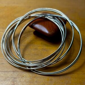 Sterling Silver Rolling 10 Bangle Bracelet